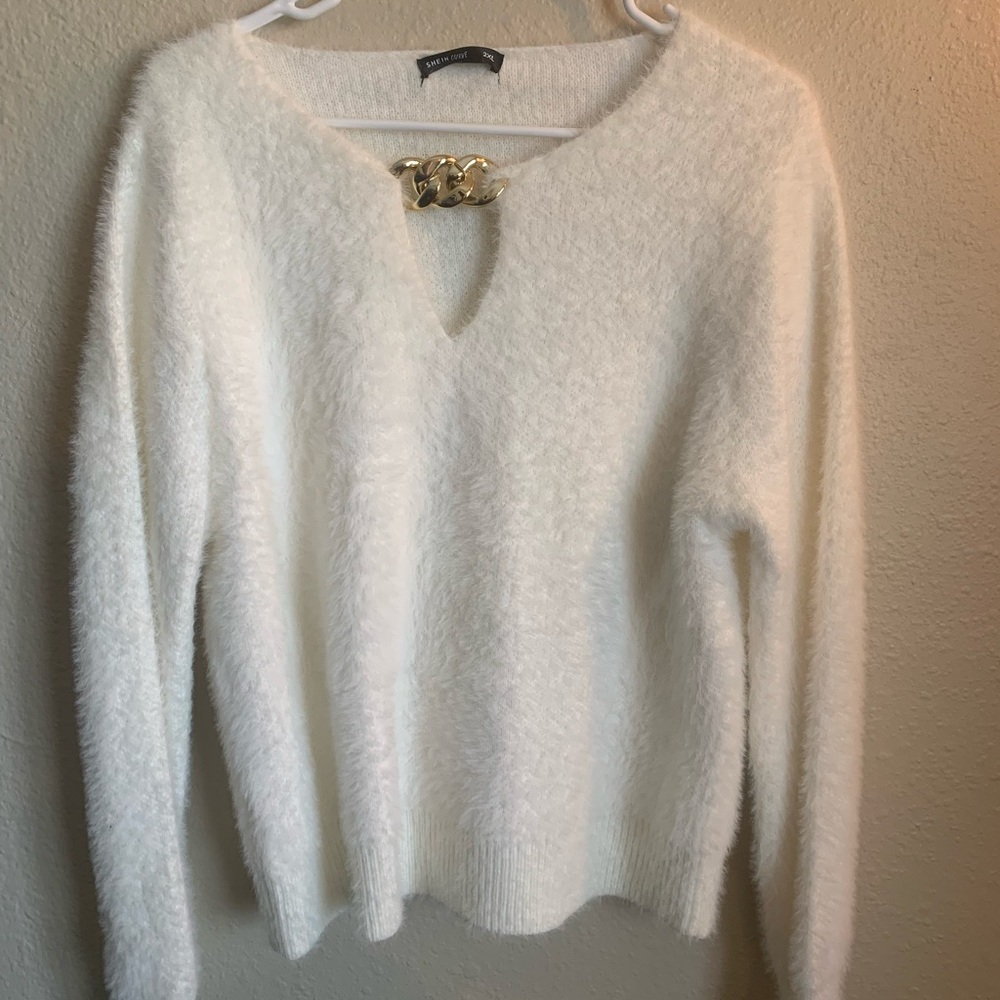 Soft White Sweater with Gold Chain Accent
